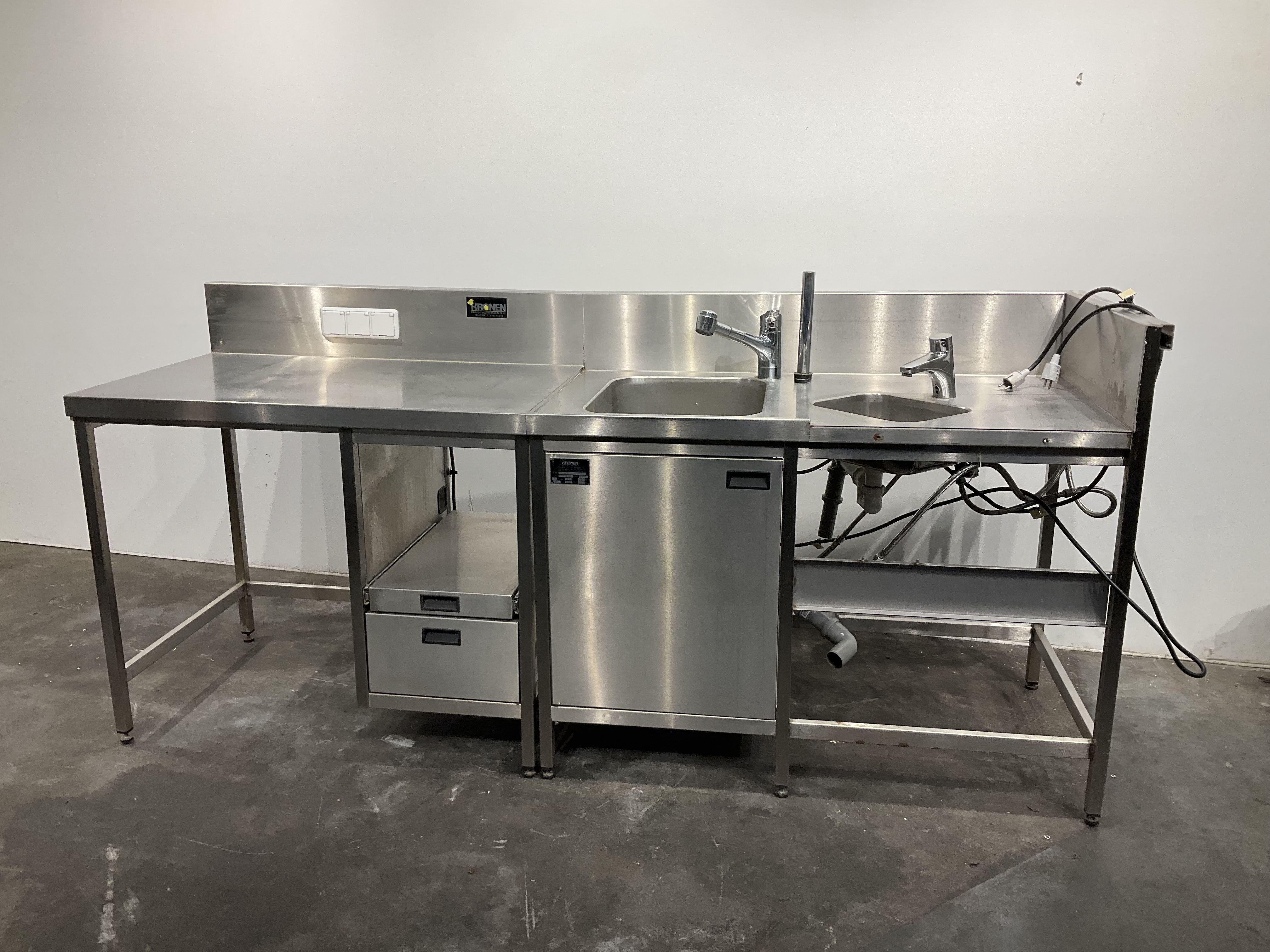 Stainless steel table with sink, used